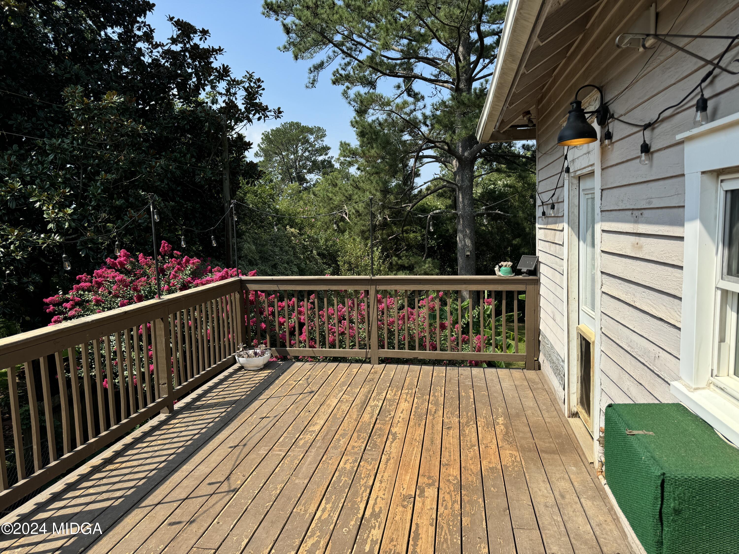 910 Laurel Avenue Macon, GA 31211 - Photo 21 of 41 a view of wooden balcony with wooden floor and fence