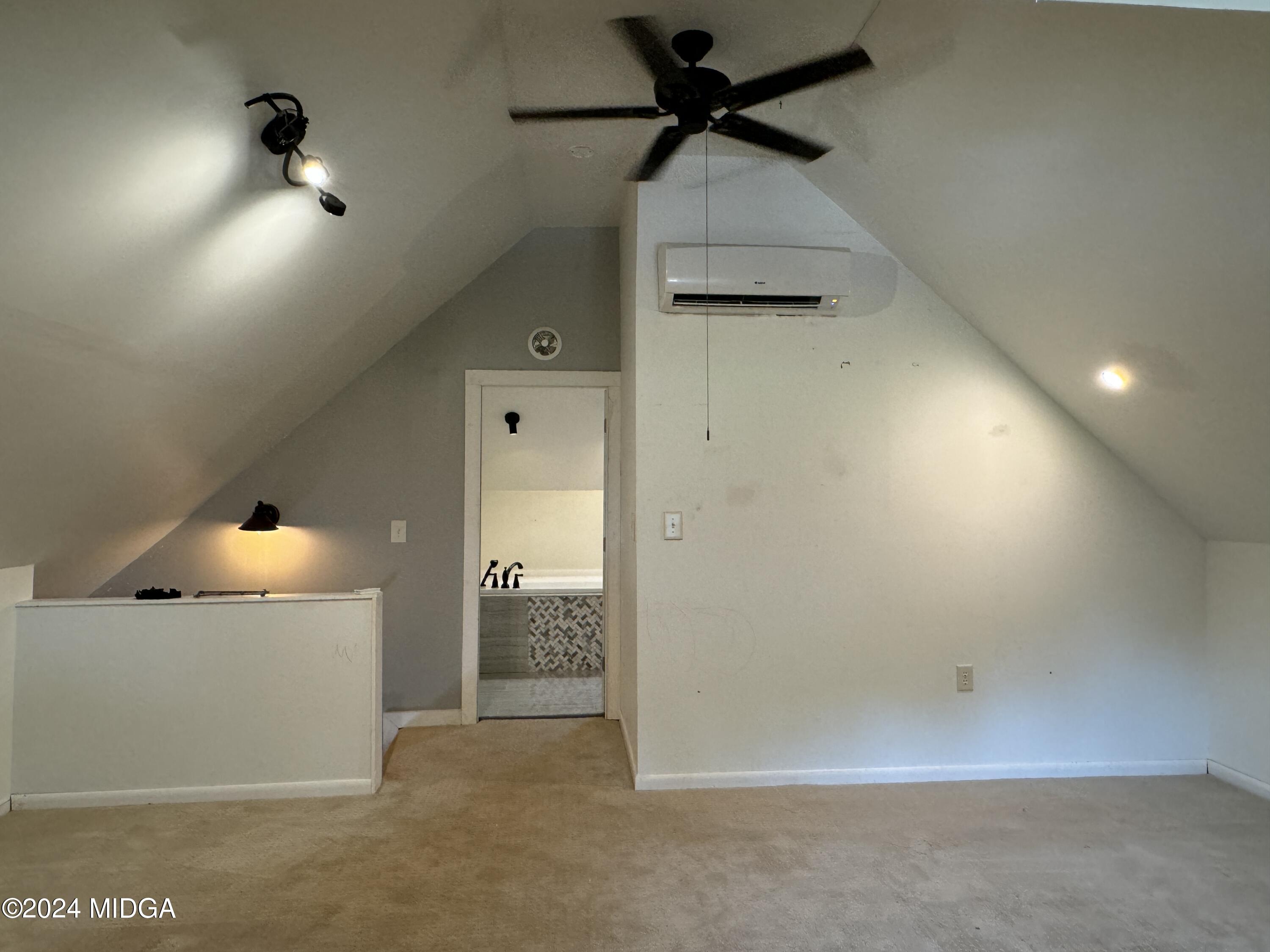 910 Laurel Avenue Macon, GA 31211 - Photo 24 of 41 wooden floor in an empty room