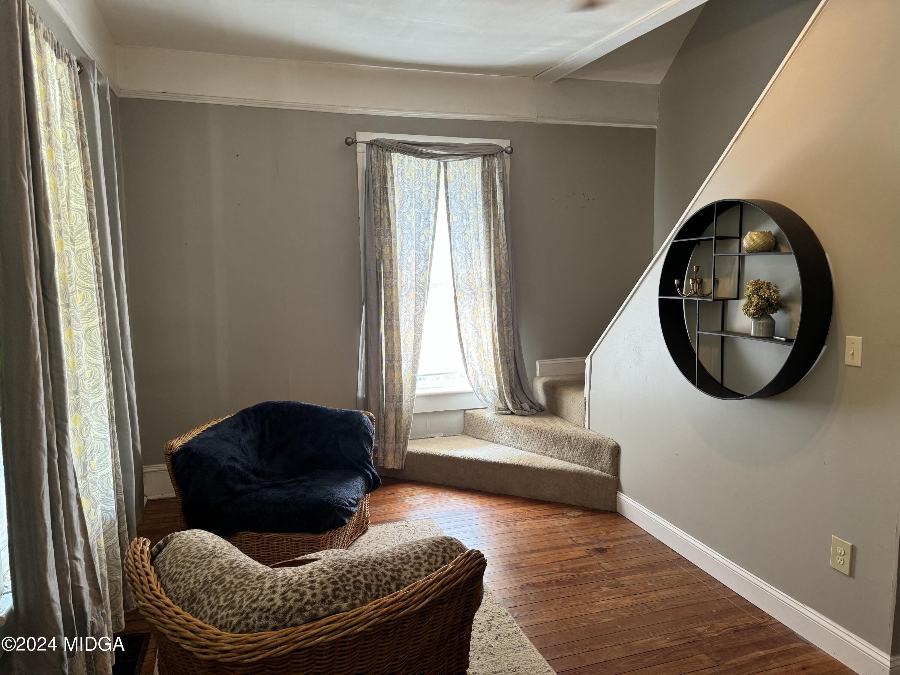 910 Laurel Avenue Macon, GA 31211 - Photo 6 of 41 a living room with furniture and a large window
