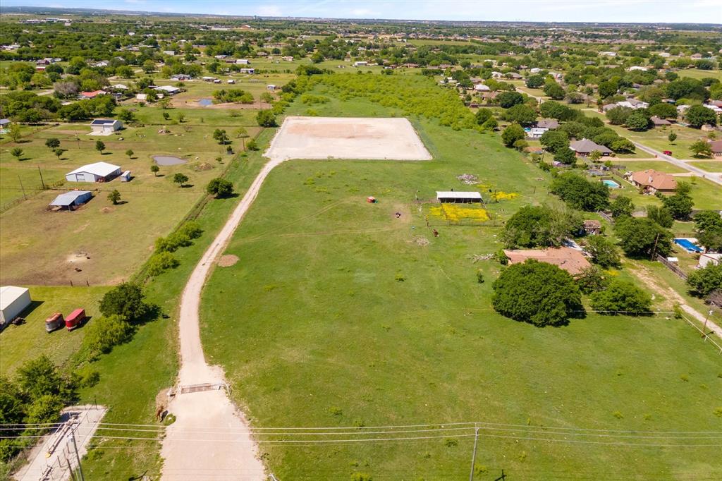 2620 County Road 920 Crowley, TX 76036 - Photo 25 of 28 an aerial view of residential houses with outdoor space