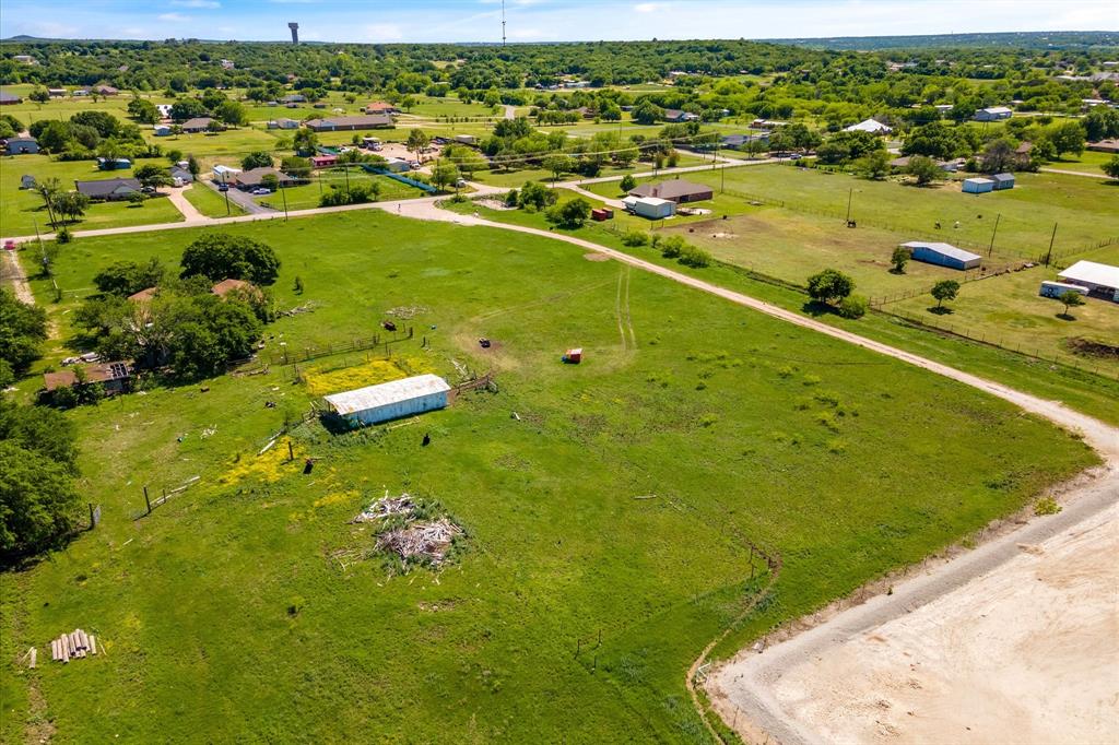 2620 County Road 920 Crowley, TX 76036 - Photo 27 of 28 an aerial view of a residential houses with outdoor space and trees all around