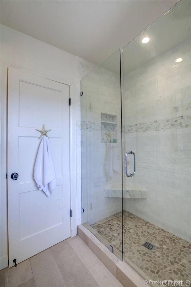 155 15th Street, Unit 19 Del Mar, CA 92014 - Photo 12 of 29 a bathroom with a shower