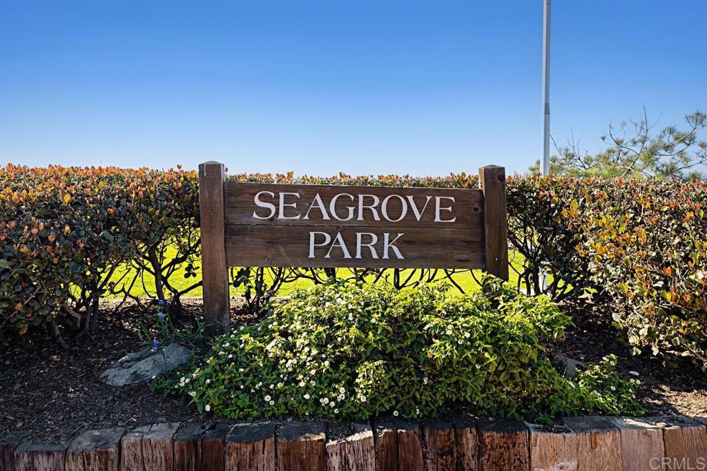 155 15th Street, Unit 19 Del Mar, CA 92014 - Photo 28 of 29 a sign on the side of a building