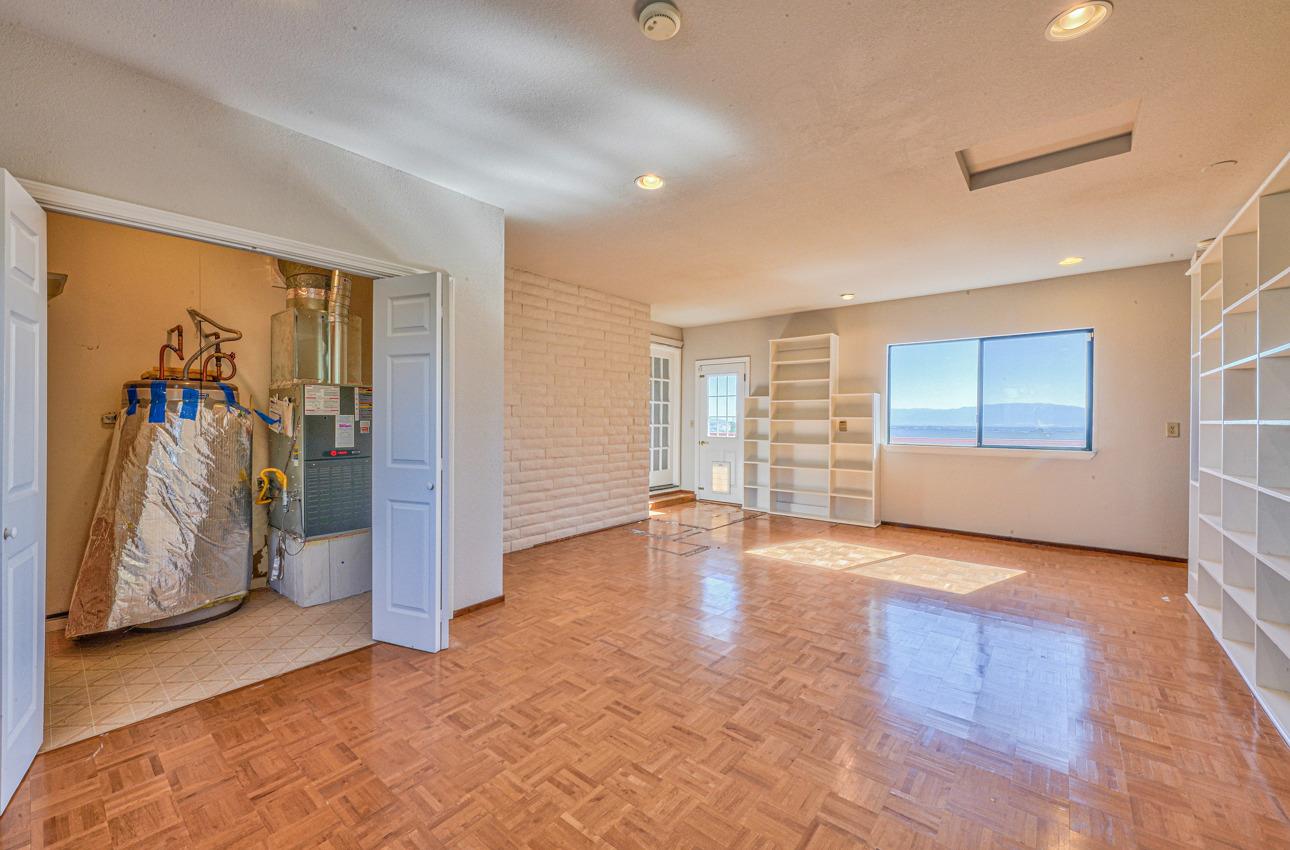 8640 Coker Road Salinas, CA 93907 - Photo 22 of 50 a view of a livingroom with a staircase and a ceiling fan