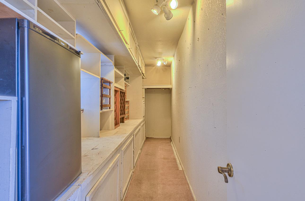 8640 Coker Road Salinas, CA 93907 - Photo 23 of 50 a view of a hallway with wooden floor and staircase