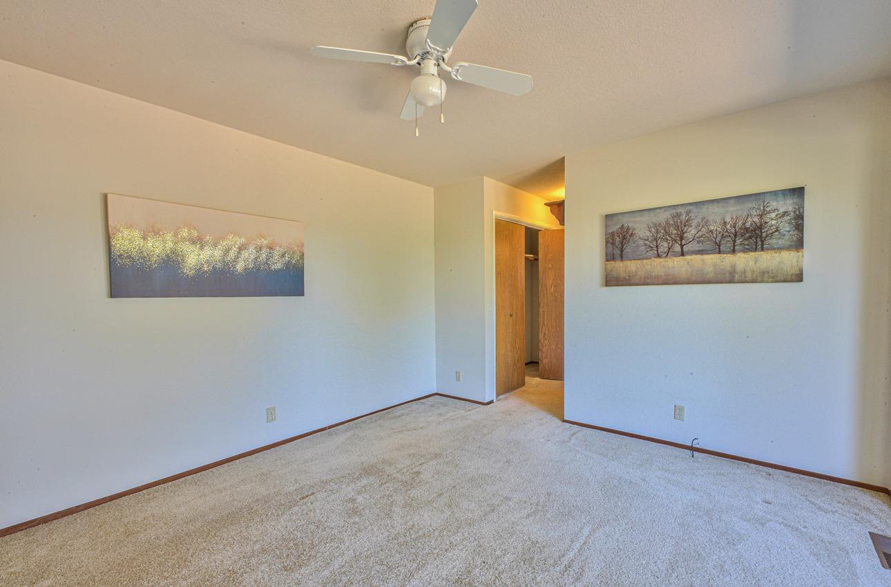8640 Coker Road Salinas, CA 93907 - Photo 28 of 50 an empty room with a ceiling fan