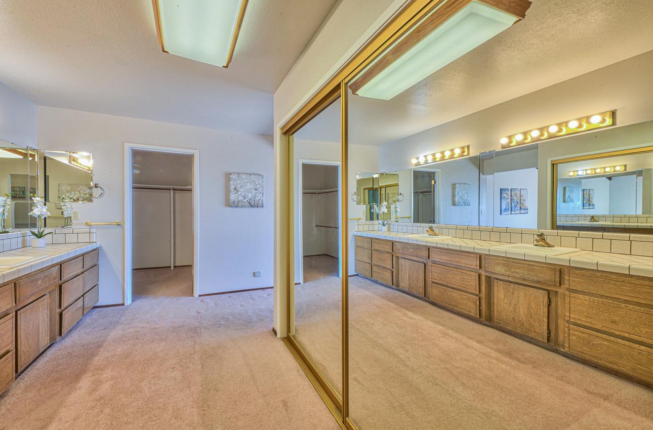 8640 Coker Road Salinas, CA 93907 - Photo 37 of 50 a large bathroom with a large tub and sink