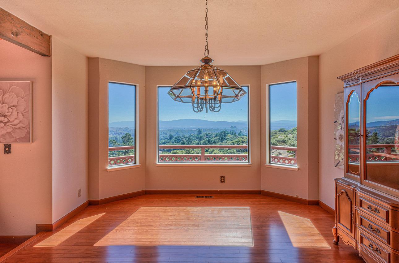 8640 Coker Road Salinas, CA 93907 - Photo 9 of 50 a view of a room with window wooden floor and front door