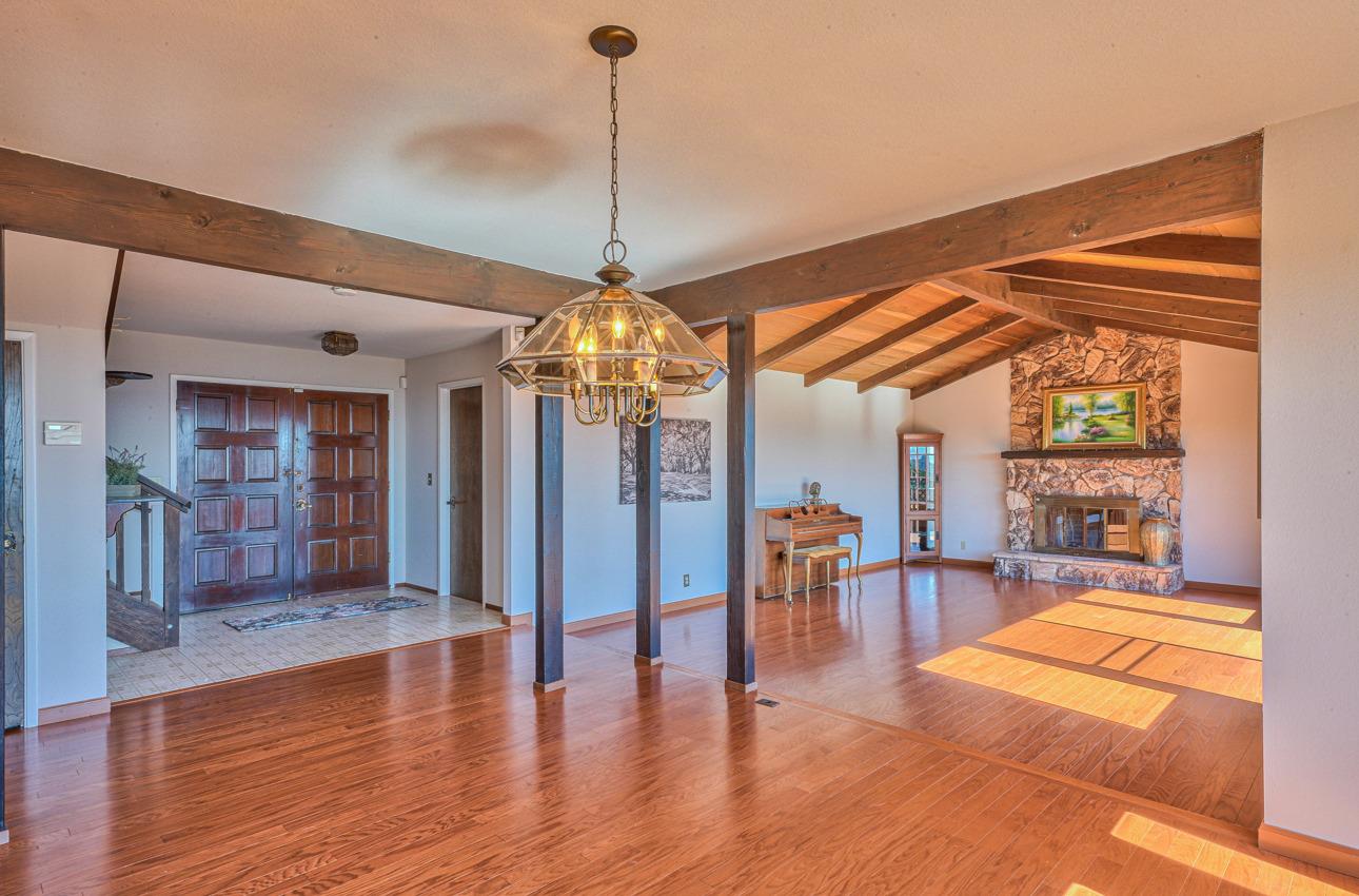 8640 Coker Road Salinas, CA 93907 - Photo 10 of 50 a view of a livingroom with furniture wooden floor and a chandelier