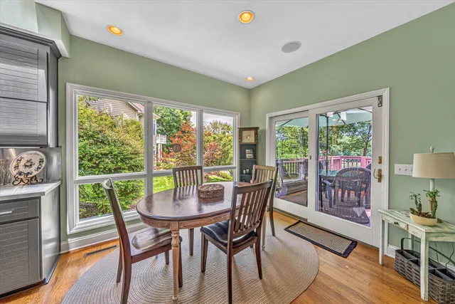 a view of a two chair and table in the balcony