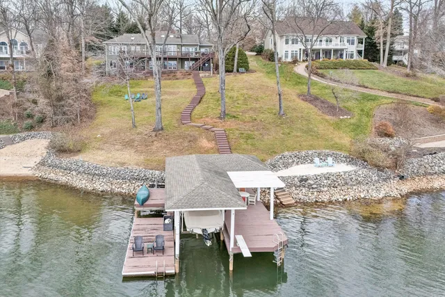 a view of a lake with a yard