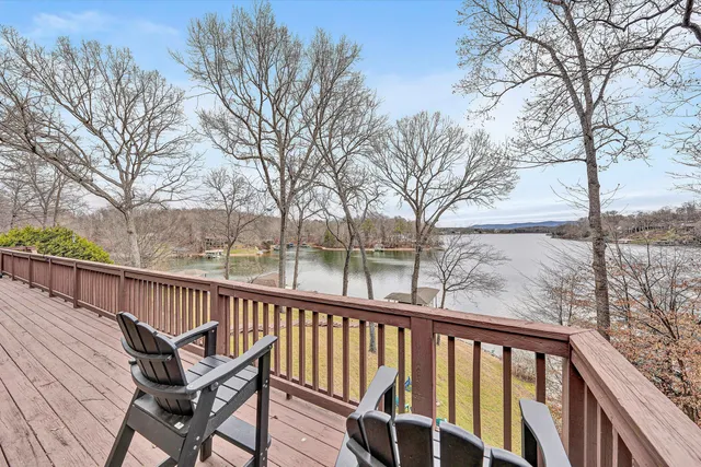 a room with a sink and a bed