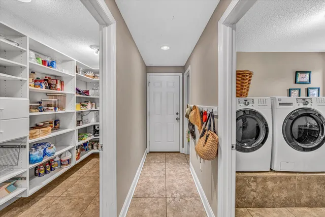 a bathroom with a toilet sink and a mirror