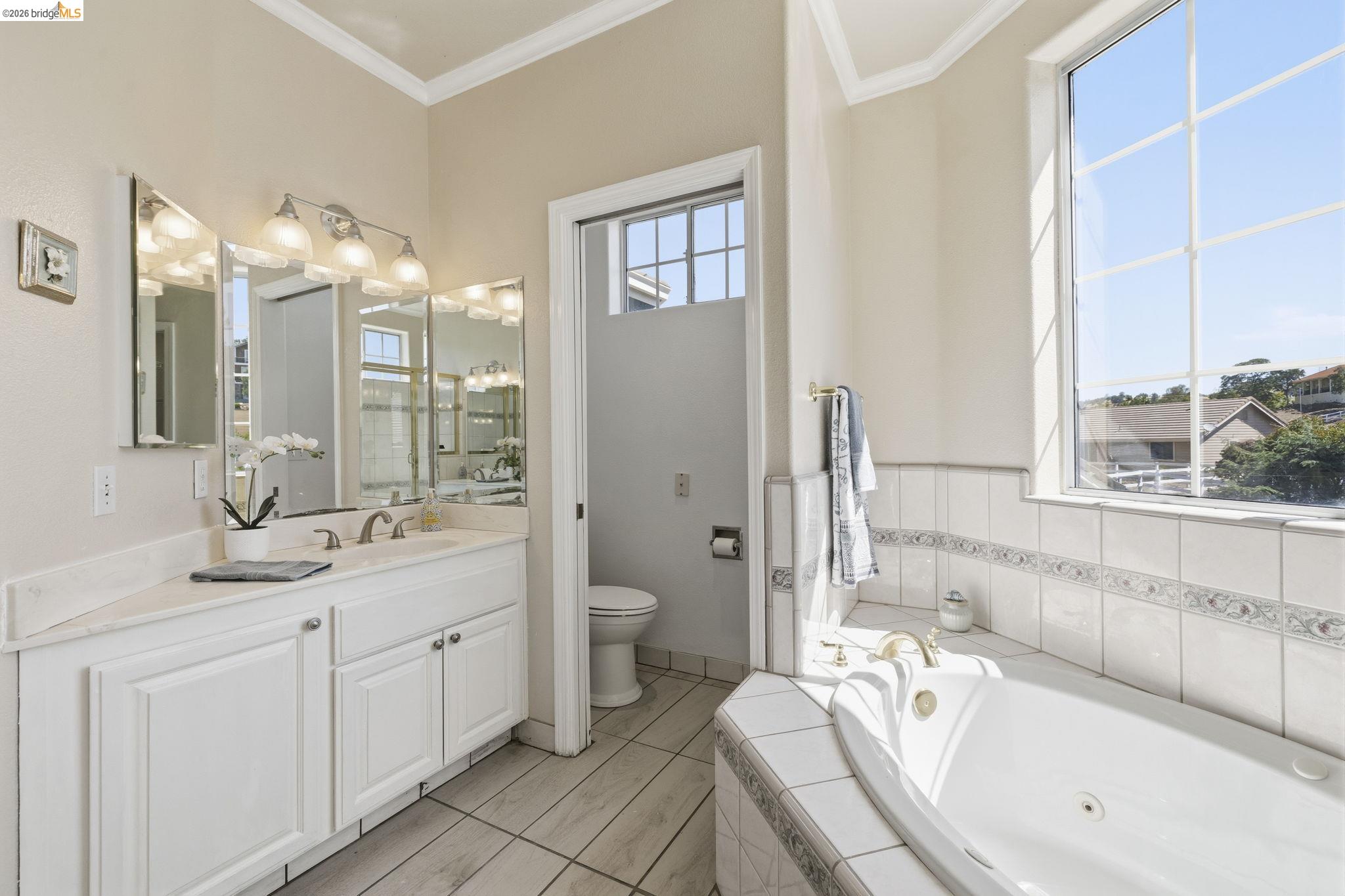 6242 Bluff View Road Copperopolis, CA 95228 - Photo 37 of 59 Windowed soaking tub with tiled surround