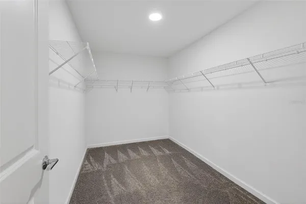 a view of a room with racks on the wall