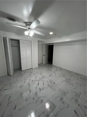 a view of a hallway with a chandelier