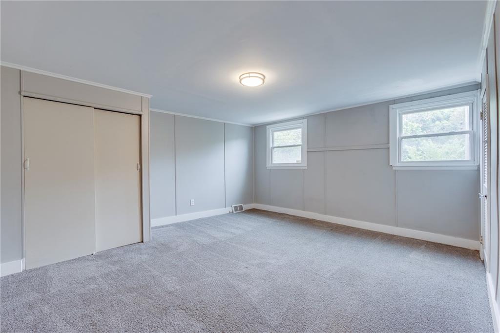 1931 Federal Street Extension Pittsburgh, PA 15212 - Photo 16 of 32 an empty room with windows