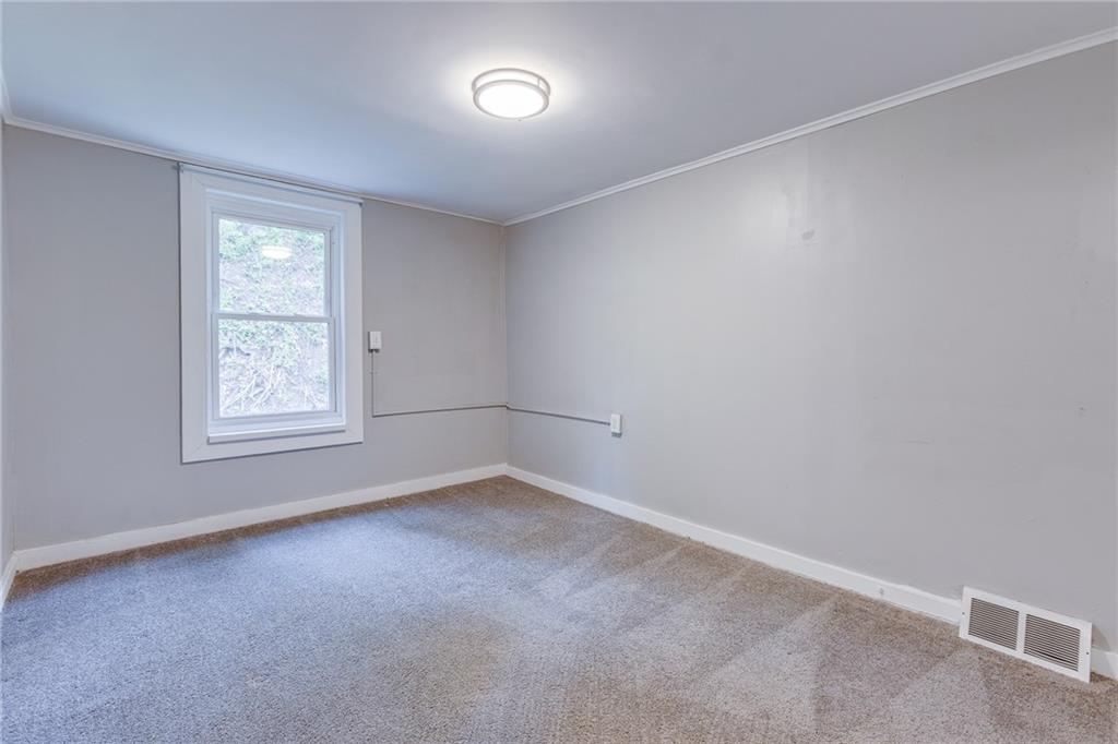 1931 Federal Street Extension Pittsburgh, PA 15212 - Photo 25 of 32 an empty room with windows