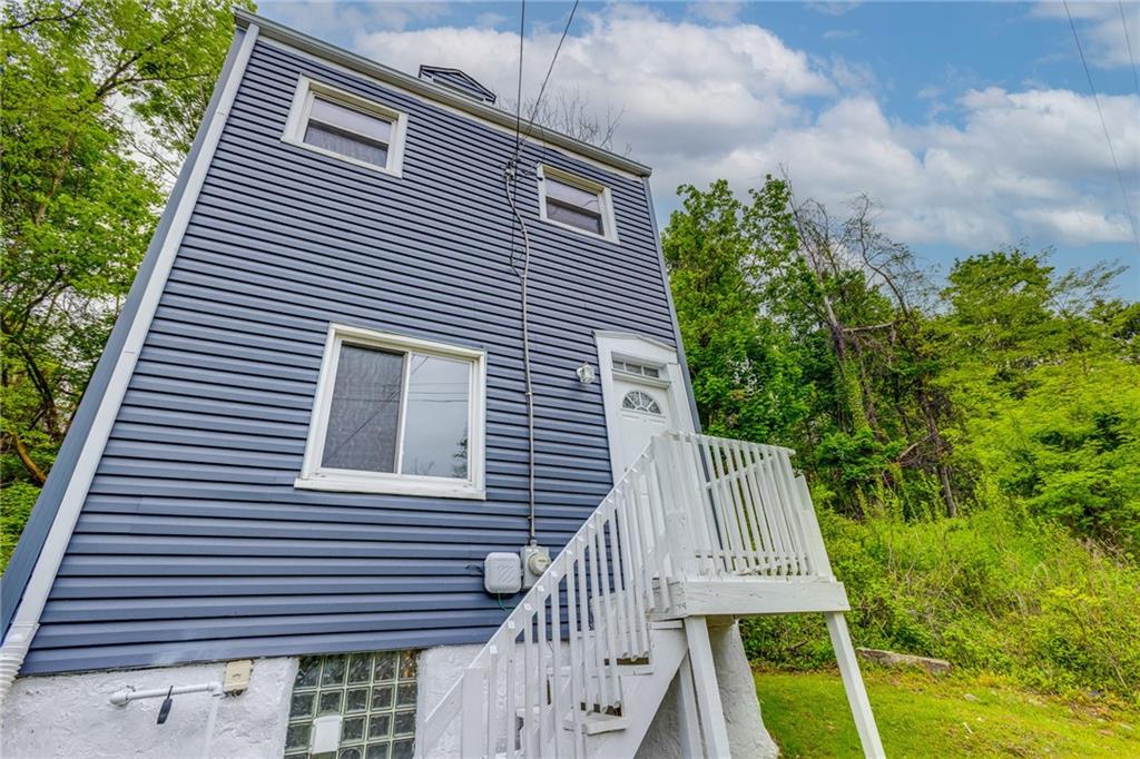 1931 Federal Street Extension Pittsburgh, PA 15212 - Photo 3 of 32 a view of a house with a yard
