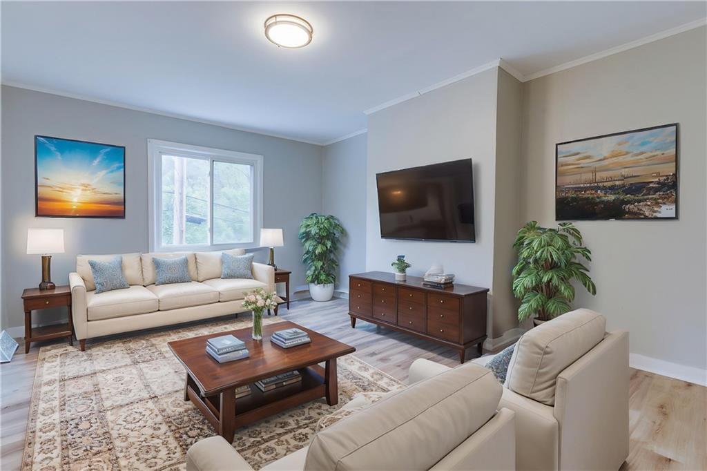 1931 Federal Street Extension Pittsburgh, PA 15212 - Photo 5 of 32 a living room with furniture and a flat screen tv
