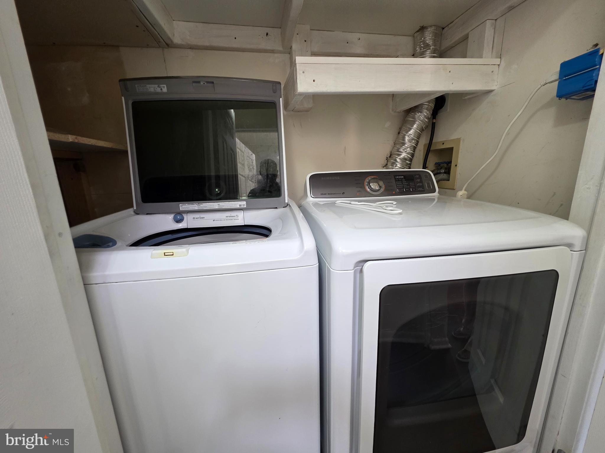 22 D Oyster Bay Absecon, NJ 08201 - Photo 5 of 13 a utility room with dryer and washer