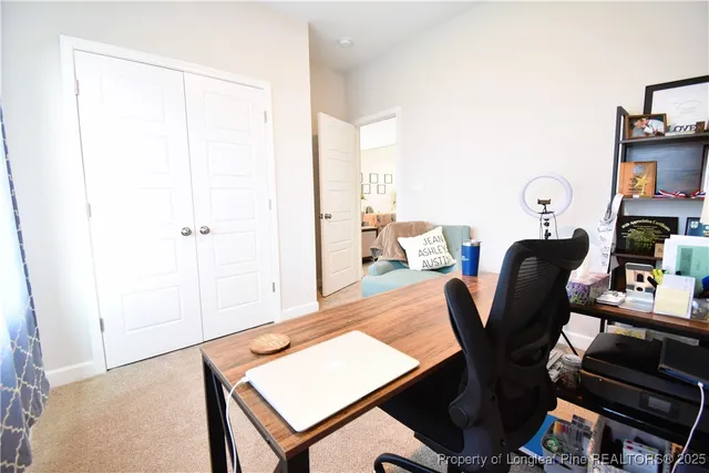 a view of workspace with lounge chair