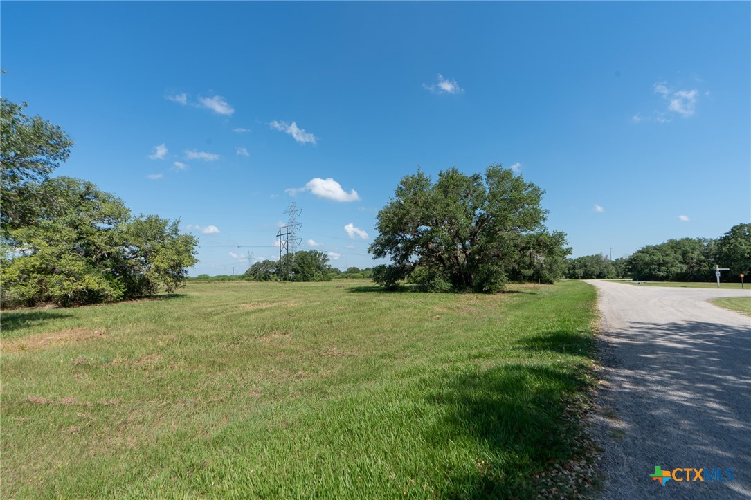 Lot 41 Perdido Pointe Estates Victoria, TX 77905 - Photo 6 of 14 a view of a lake with a yard