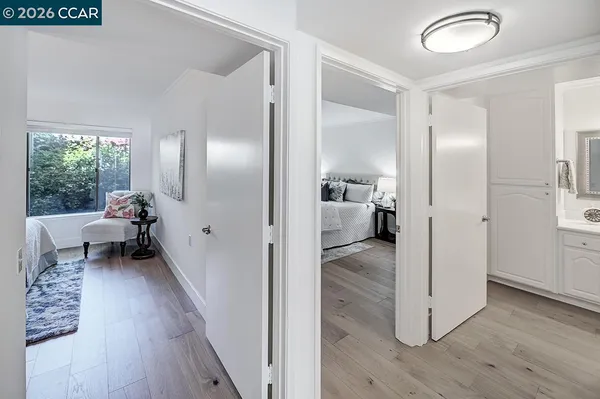 a bed room with a bed and a night stand