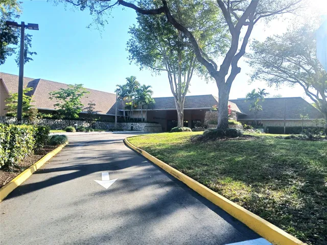 a view of swimming pool with a yard