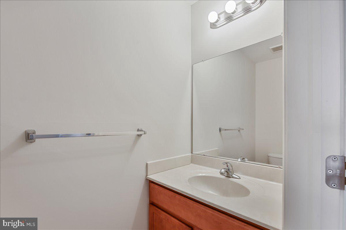 136 Kelly Driver Road Laurel Springs, NJ 08021 - Photo 19 of 35 a bathroom with a sink and a mirror