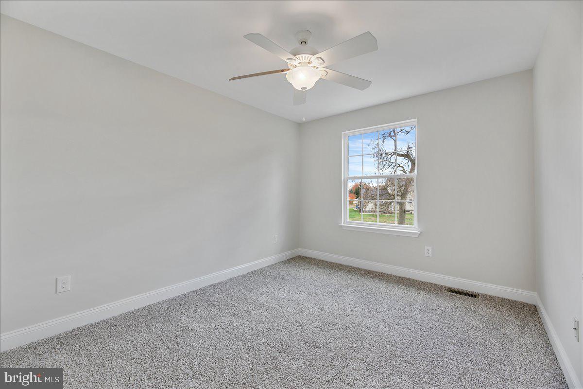 136 Kelly Driver Road Laurel Springs, NJ 08021 - Photo 28 of 35 an empty room with windows and fan
