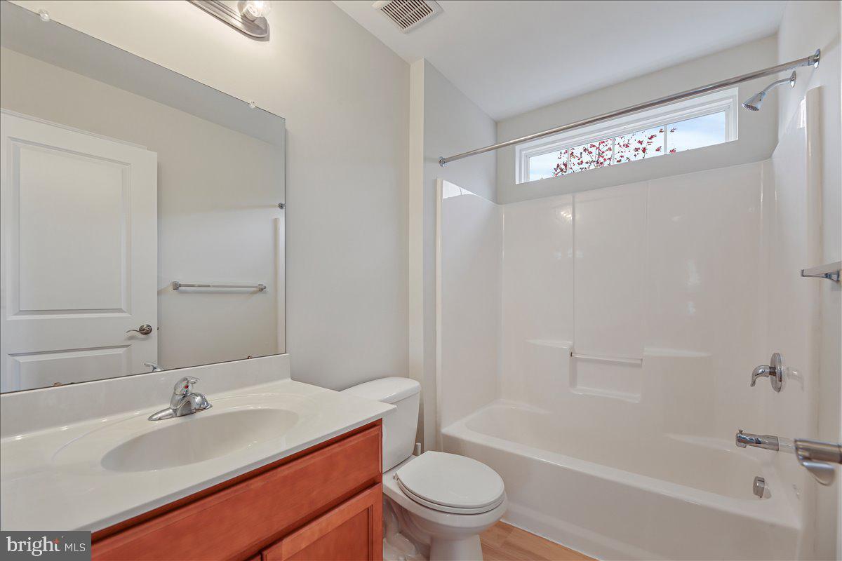 136 Kelly Driver Road Laurel Springs, NJ 08021 - Photo 29 of 35 a bathroom with a sink a toilet and shower