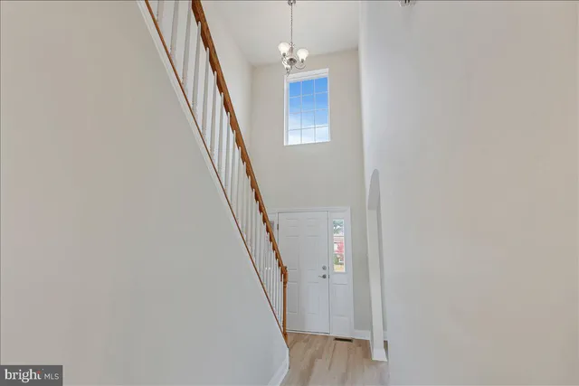 a view of a livingroom with stairs