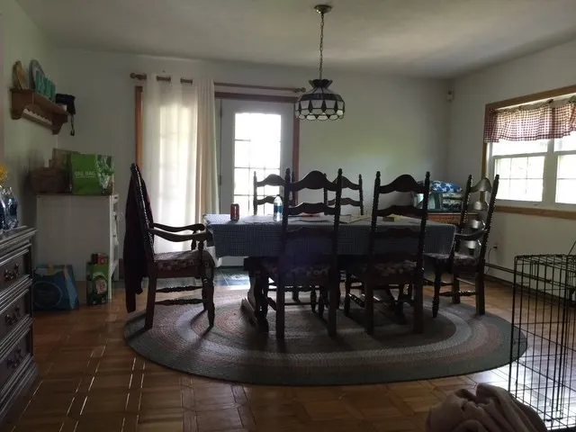 a view of a dining room with furniture