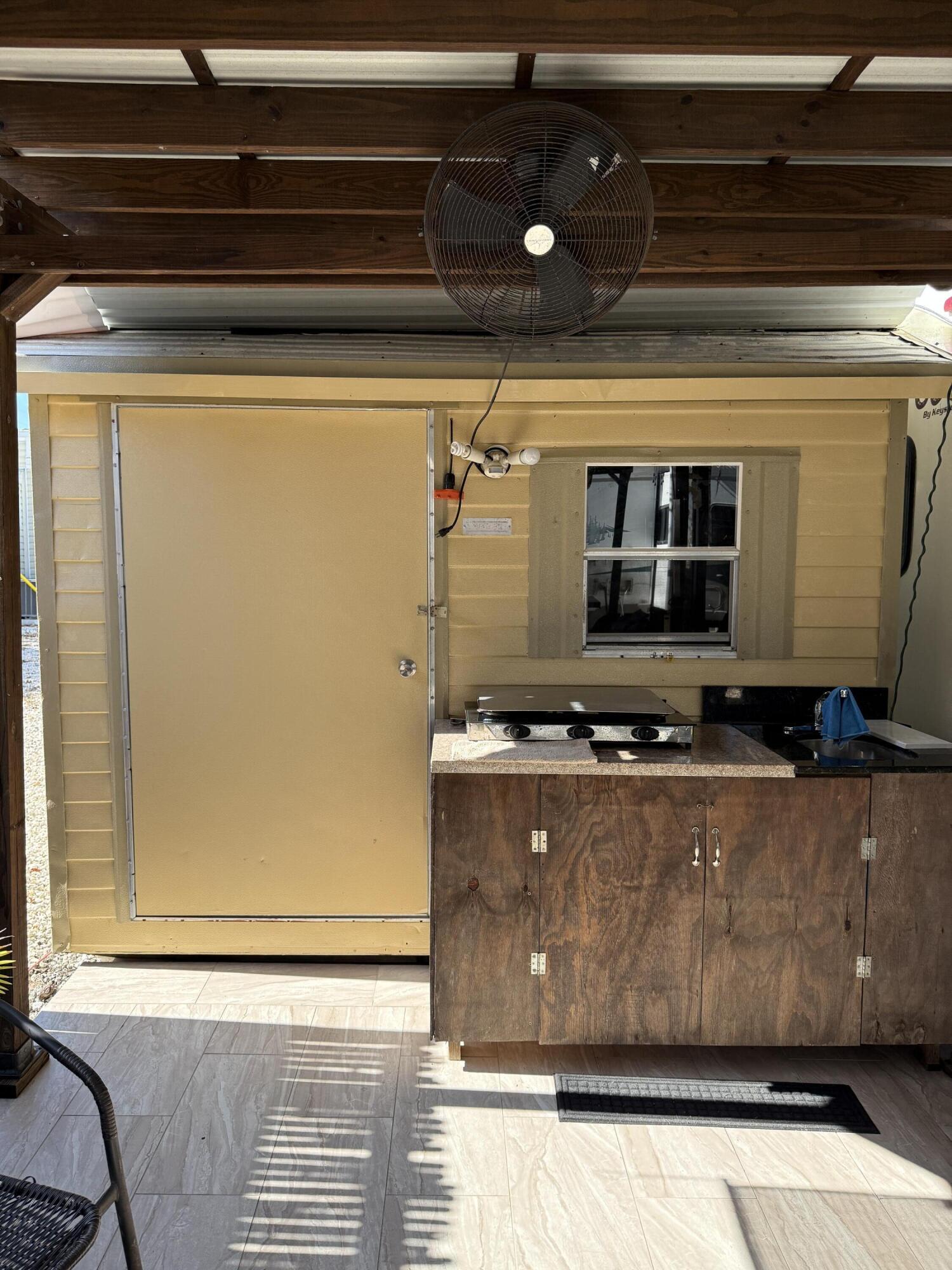 325 Calusa Street, Unit 393 Key Largo, FL 33037 - Photo 12 of 61 a view of washer and dryer with a projector