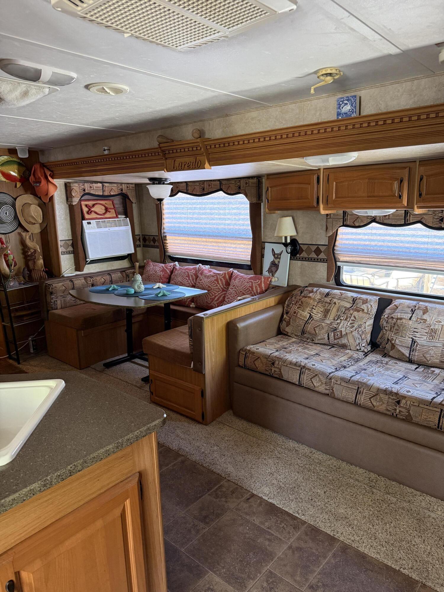 325 Calusa Street, Unit 393 Key Largo, FL 33037 - Photo 14 of 61 a living room with furniture and a rug