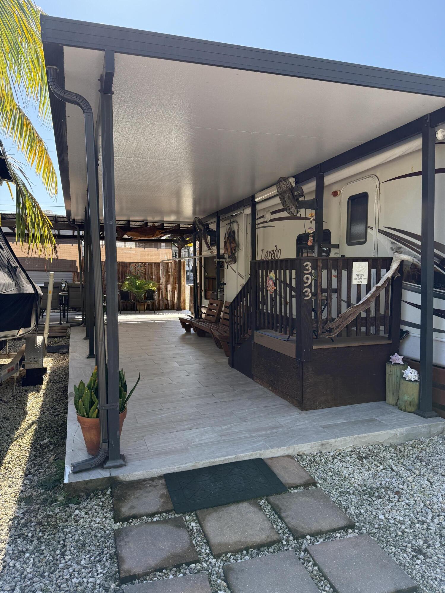 325 Calusa Street, Unit 393 Key Largo, FL 33037 - Photo 2 of 61 a view of entryway livingroom and hall