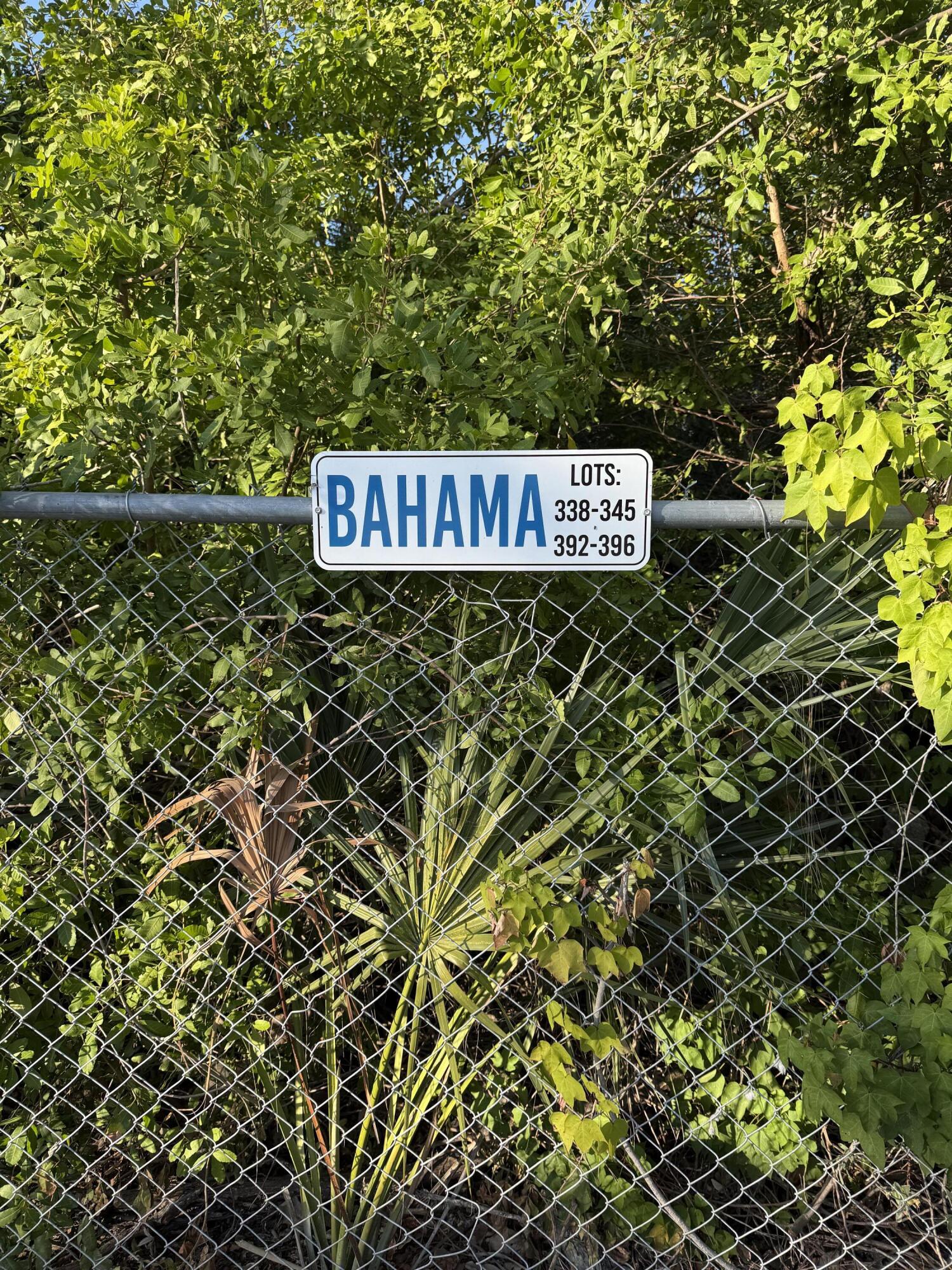 325 Calusa Street, Unit 393 Key Largo, FL 33037 - Photo 29 of 61 a view of a sign of the tree