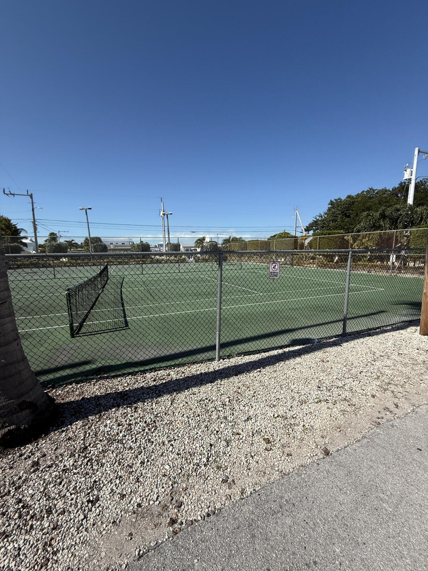 325 Calusa Street, Unit 393 Key Largo, FL 33037 - Photo 32 of 61 a view of a yard