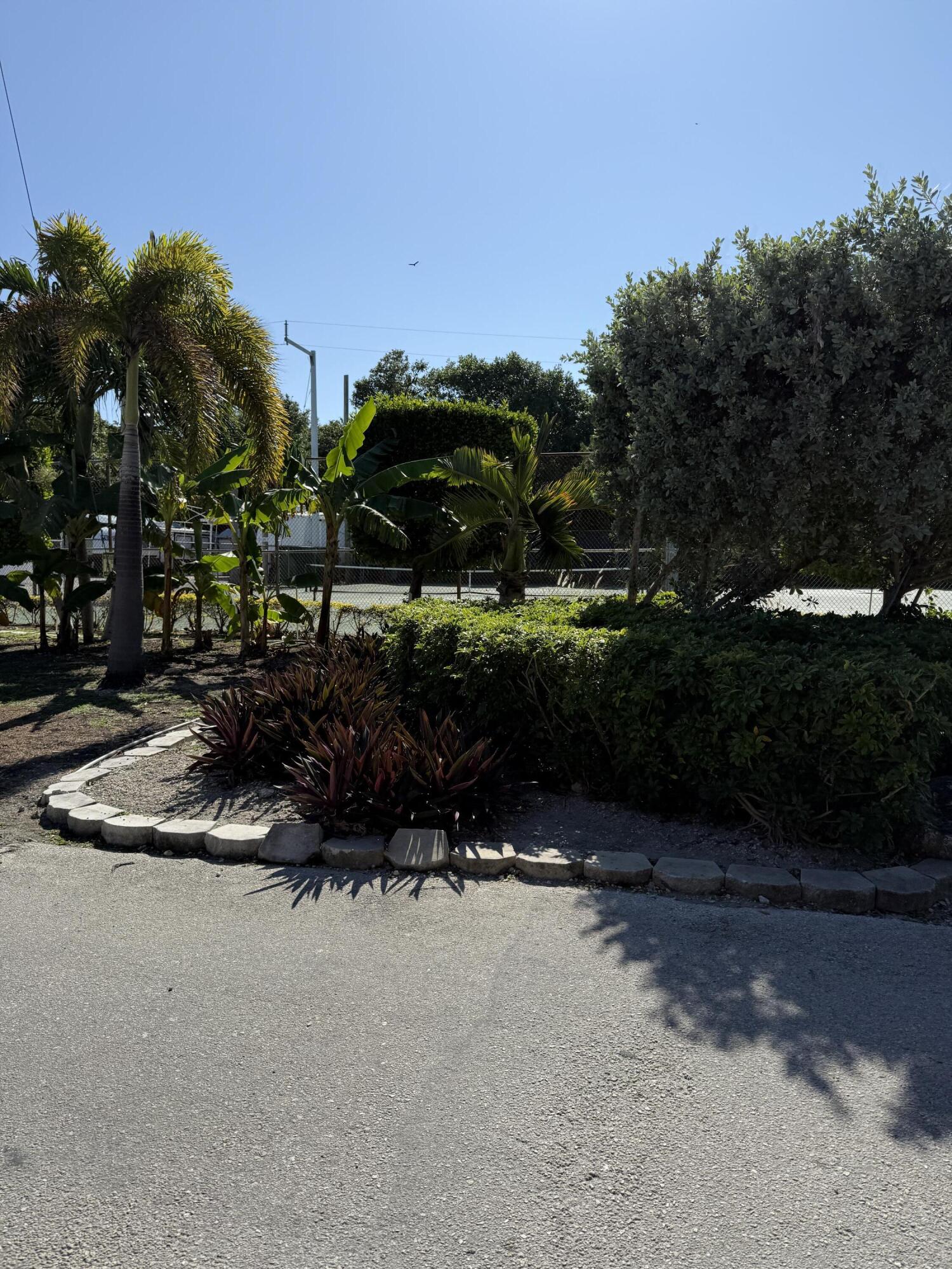 325 Calusa Street, Unit 393 Key Largo, FL 33037 - Photo 35 of 61 a view of outdoor space and yard