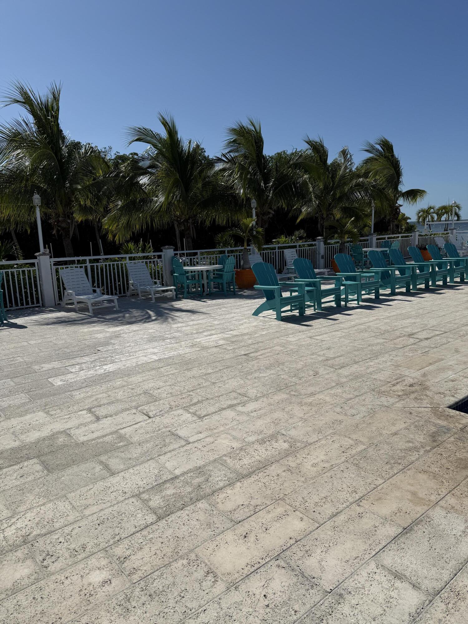 325 Calusa Street, Unit 393 Key Largo, FL 33037 - Photo 40 of 61 a view of swimming pool with a patio