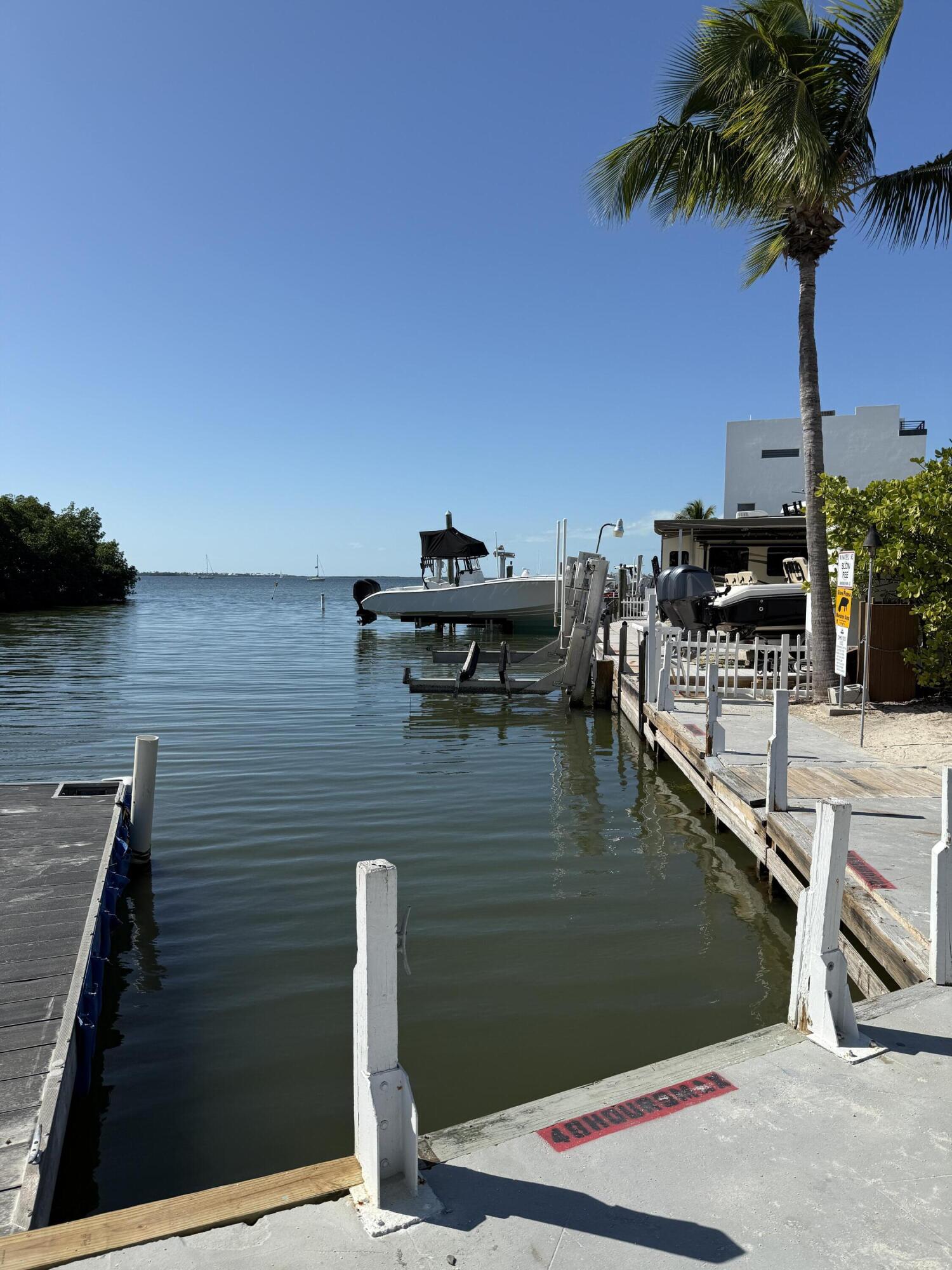 325 Calusa Street, Unit 393 Key Largo, FL 33037 - Photo 48 of 61 a view of a balcony with chairs