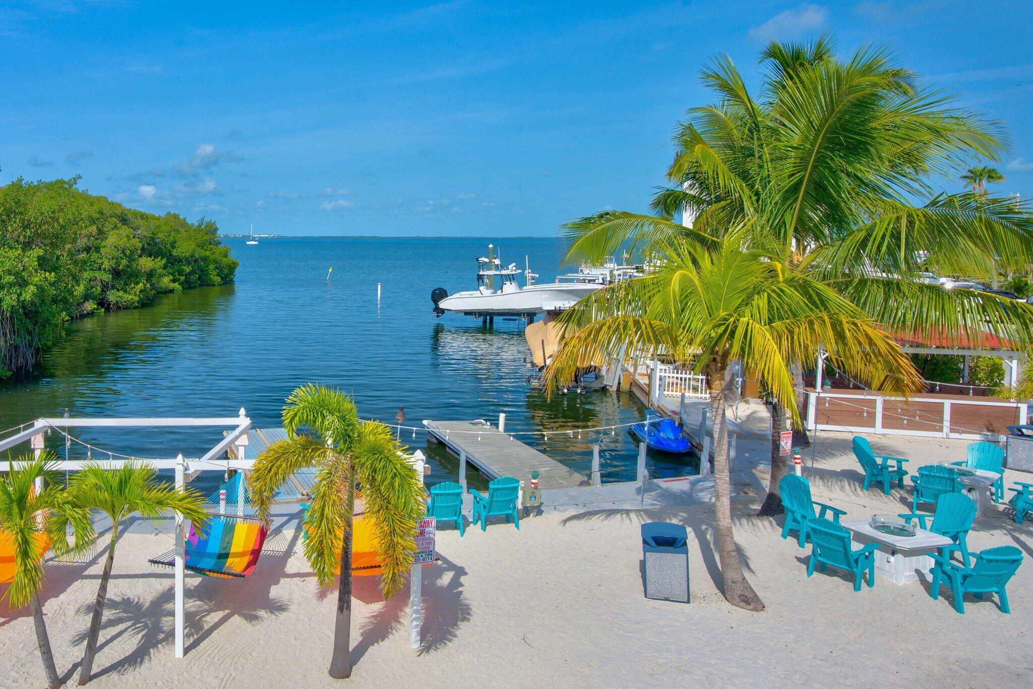 325 Calusa Street, Unit 393 Key Largo, FL 33037 - Photo 60 of 61 an outdoor space with seating