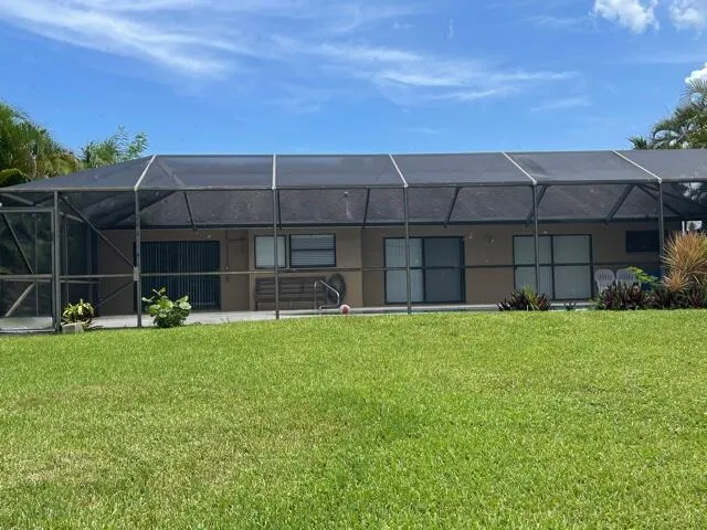 a view of a lake with a big yard