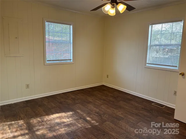 a backyard of a house with lots of green space