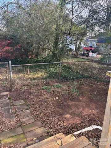 a view of a balcony with a potted plant