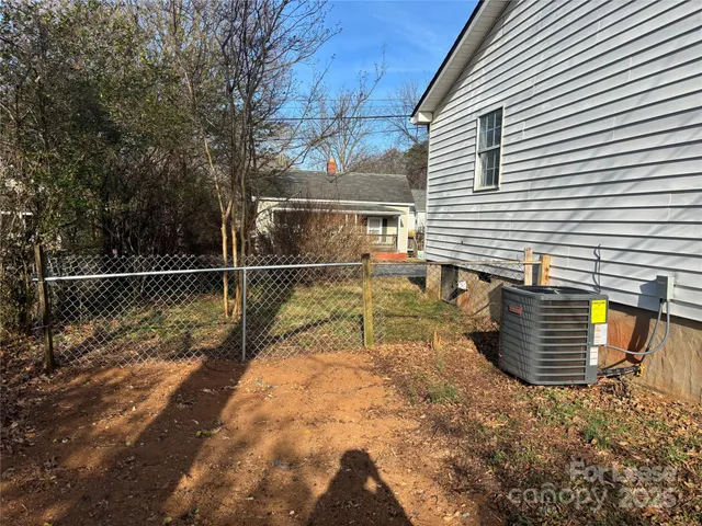 a view of backyard with deck
