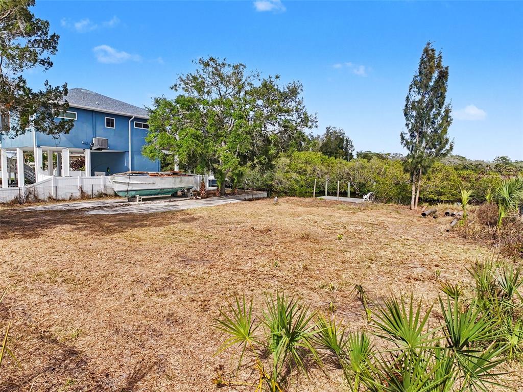 8 Rice Road Hudson, FL 34667 - Photo 26 of 30 a view of a house with a yard