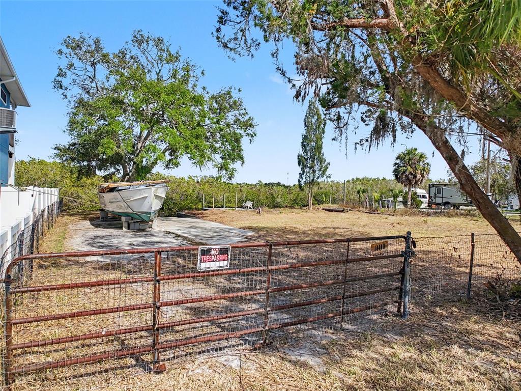 8 Rice Road Hudson, FL 34667 - Photo 28 of 30 a view of a yard with an outdoor seating