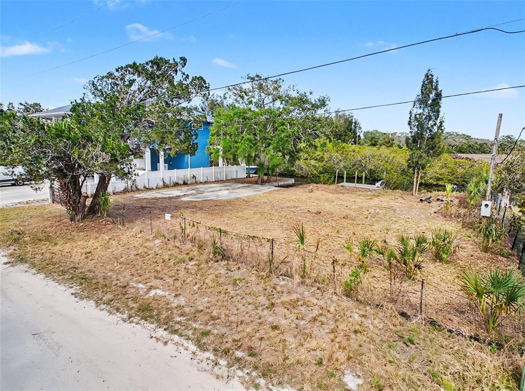 8 Rice Road Hudson, FL 34667 - Photo 10 of 30 a view of a yard with plants and trees